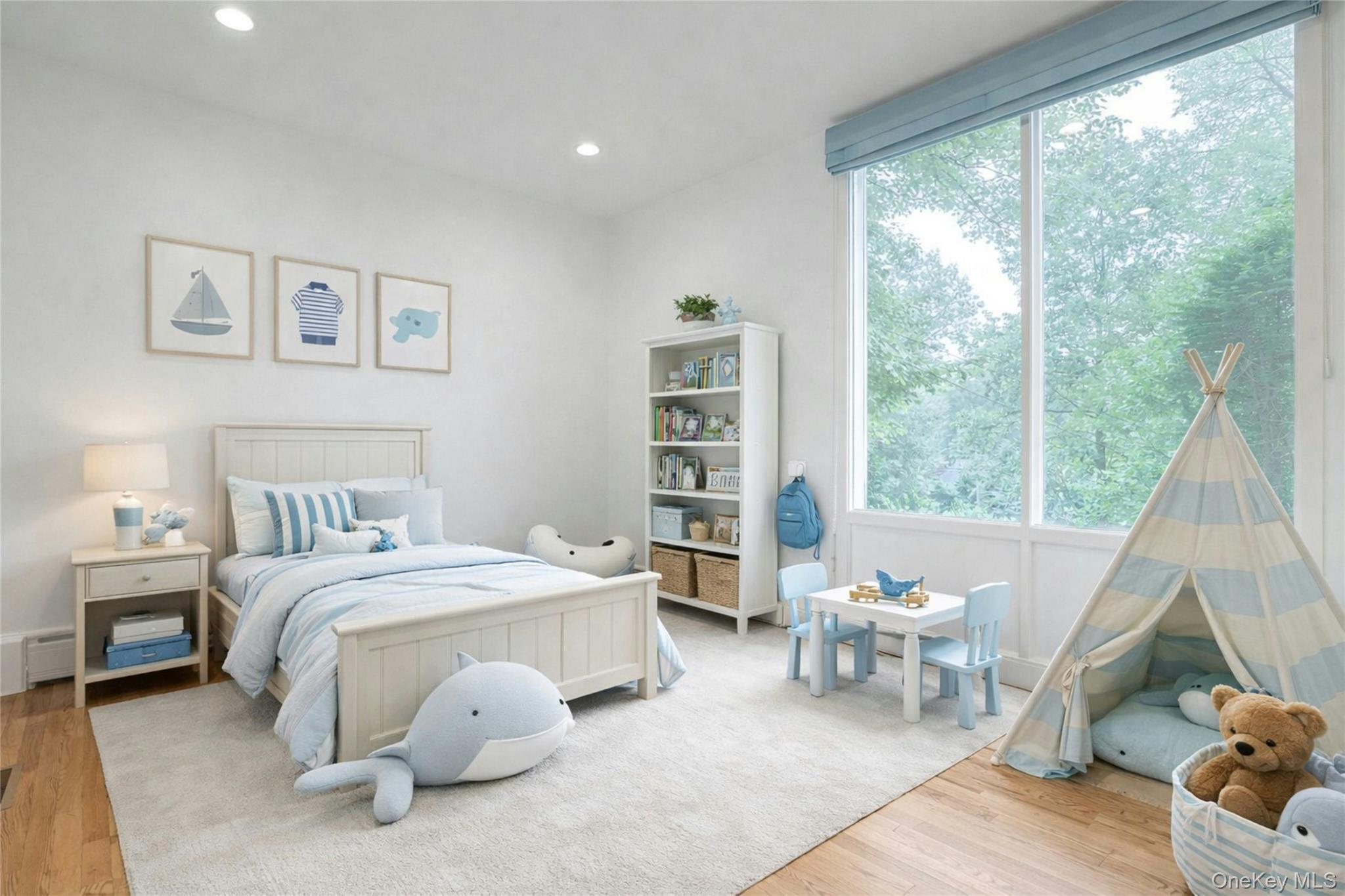 20 Sprain Valley Road Scarsdale, NY 10583 - Photo 20 of 30 Bright and spacious secondary bedroom featuring hardwood floors, oversized windows overlooking the lush property, recessed lighting, and ample room for sleeping, studying, or relaxing. (Digitally staged.)