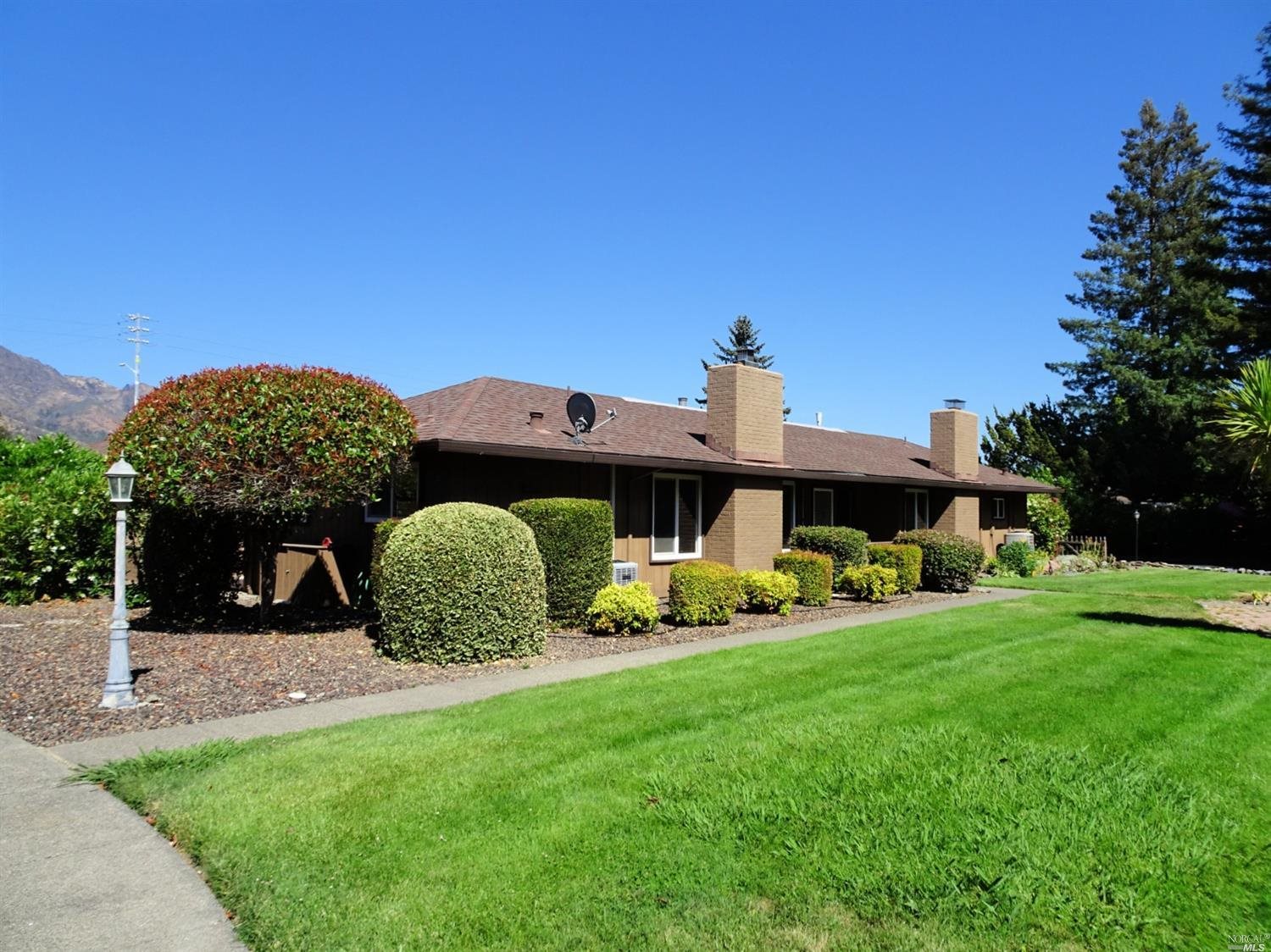 6 Woodgreen Street Santa Rosa, CA 95409 - Photo 3 of 16 a view of a house with a backyard