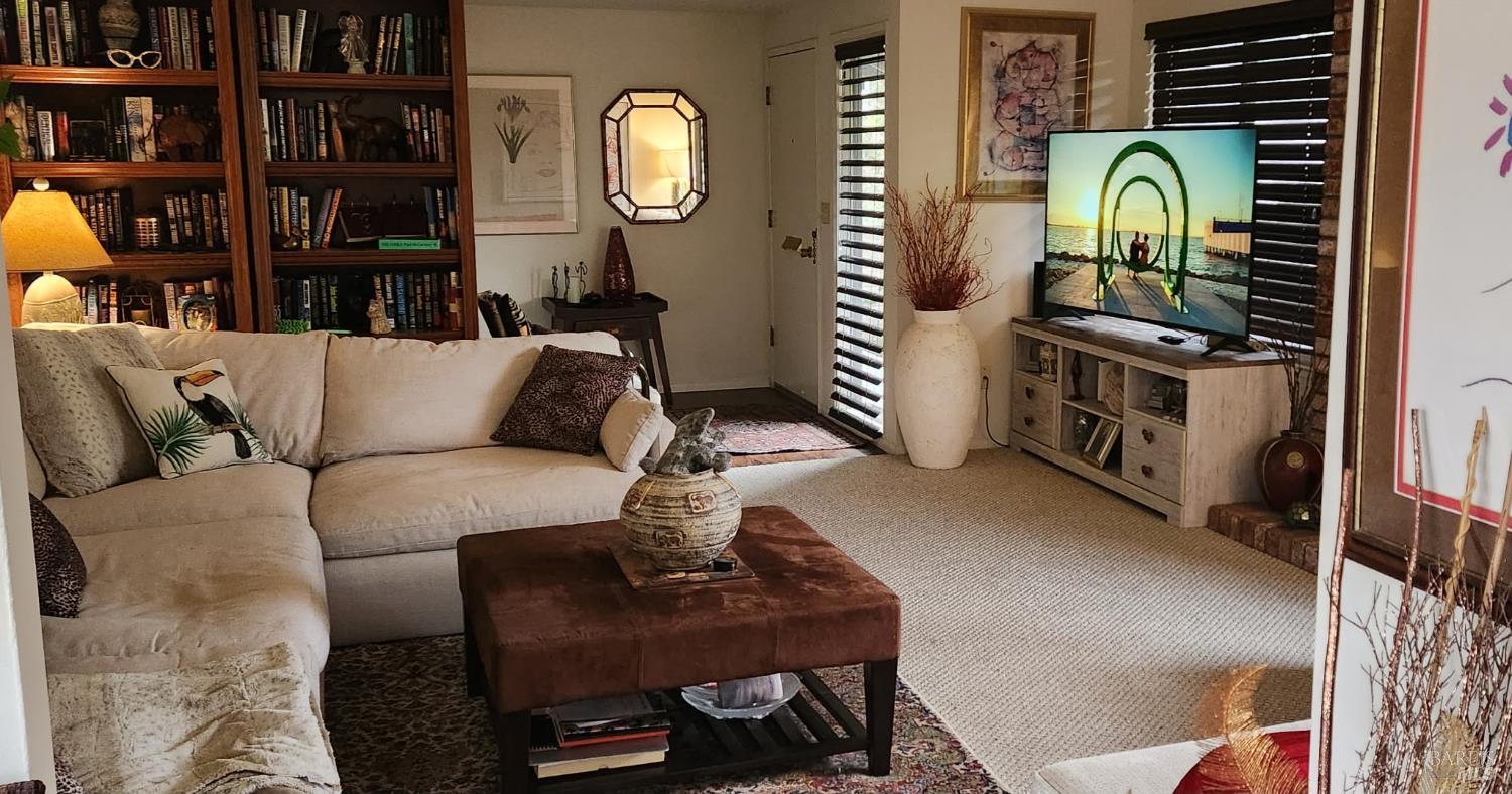 6 Woodgreen Street Santa Rosa, CA 95409 - Photo 6 of 16 a living room with furniture and a window