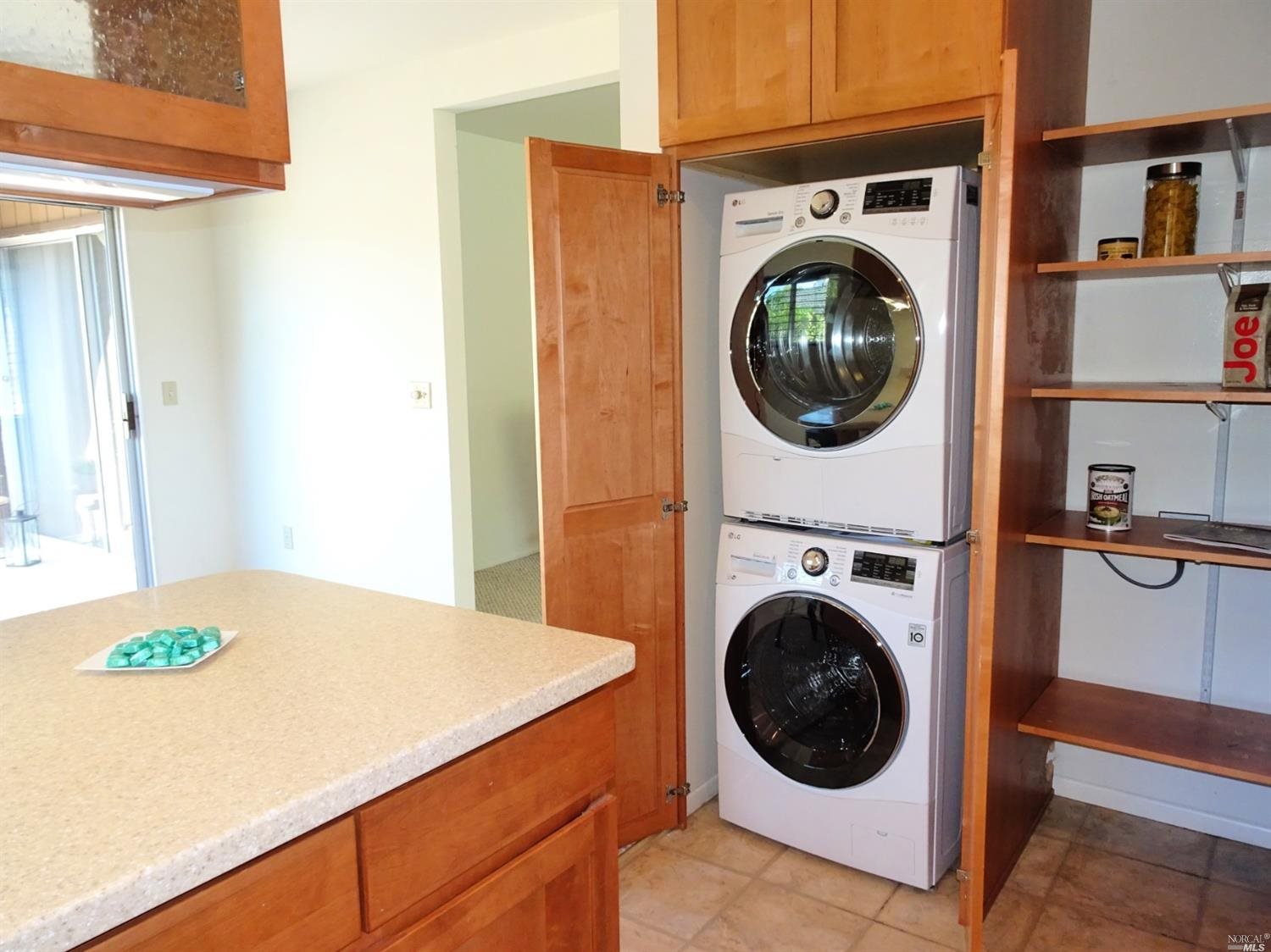 6 Woodgreen Street Santa Rosa, CA 95409 - Photo 8 of 16 a view of a hallway with washer and dryer