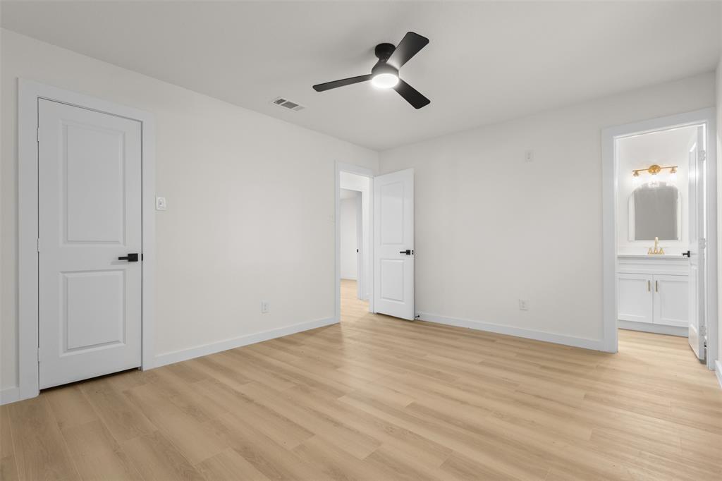 913 Roaming Rd Drive Allen, TX 75002 - Photo 7 of 11 a view of empty room with wooden floor