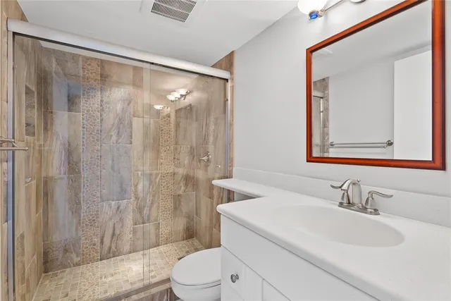 a view of a lake with a city