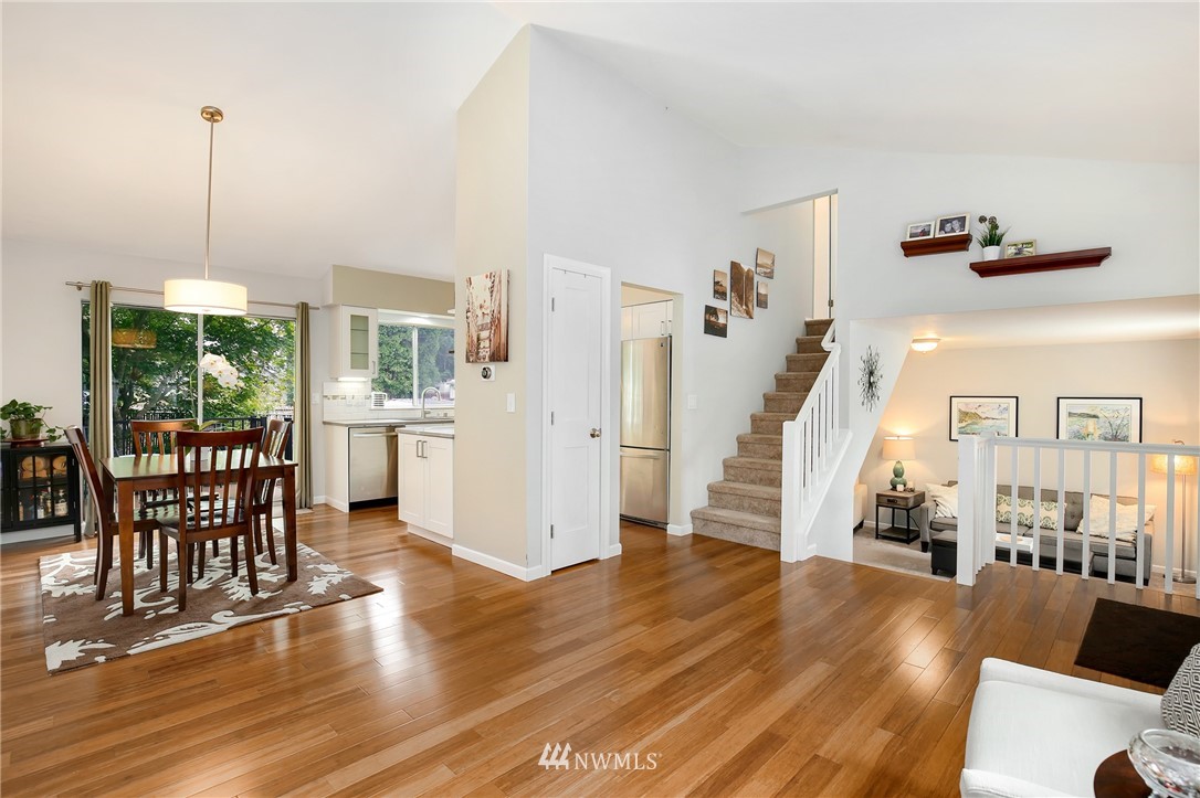 3602 Northeast 11th Court Renton, WA 98056 - Photo 2 of 25 a view of a livingroom with furniture wooden floor and windows