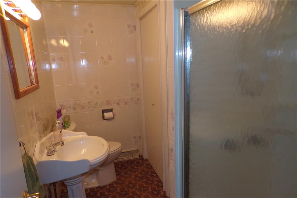 151 Shelocta Road Shelocta, PA 15774 - Photo 17 of 26 a bathroom with a sink and a mirror