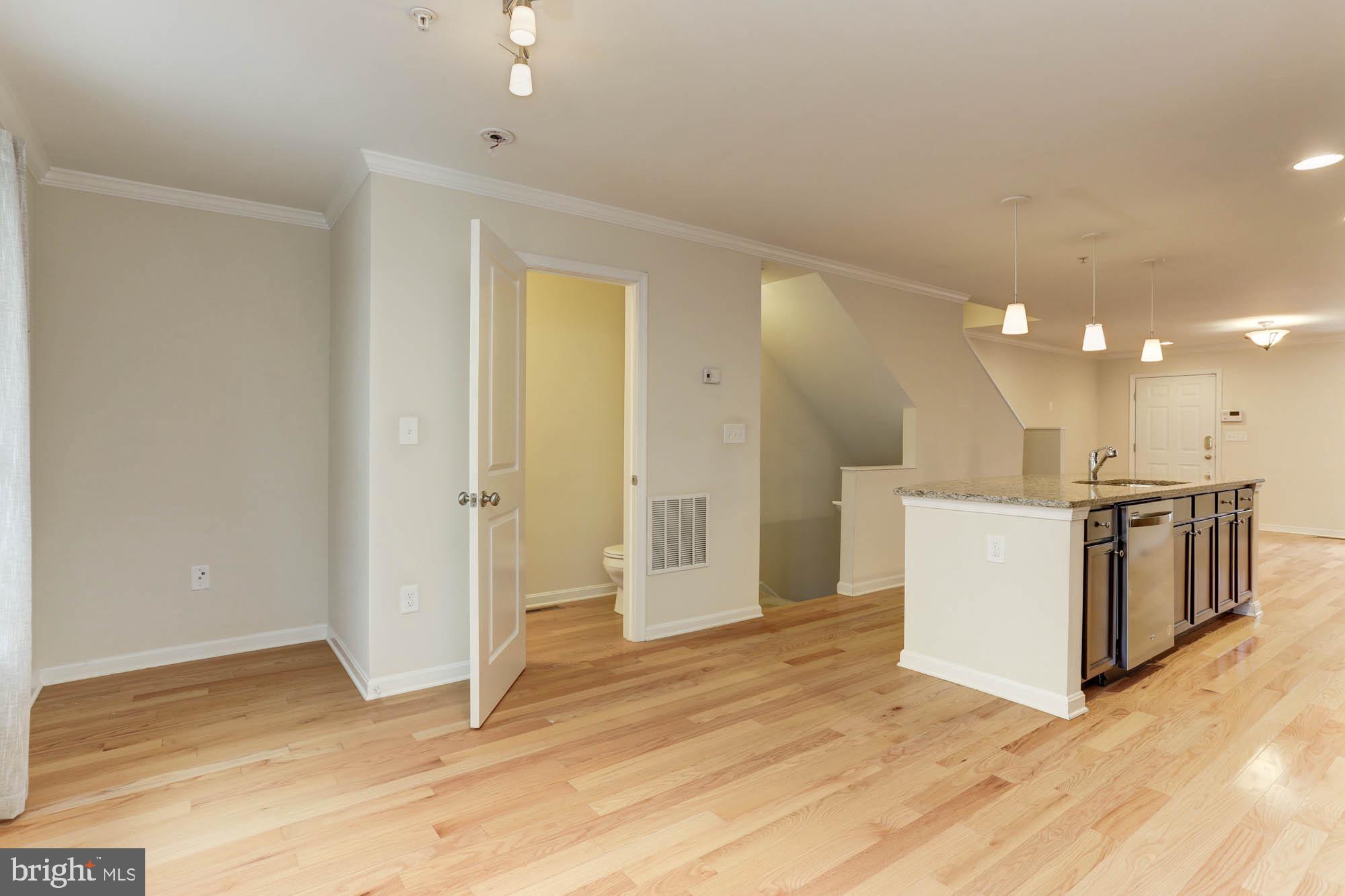 4625 Dillon Place Baltimore, MD 21224 - Photo 15 of 41 Dining area to stairs to garage