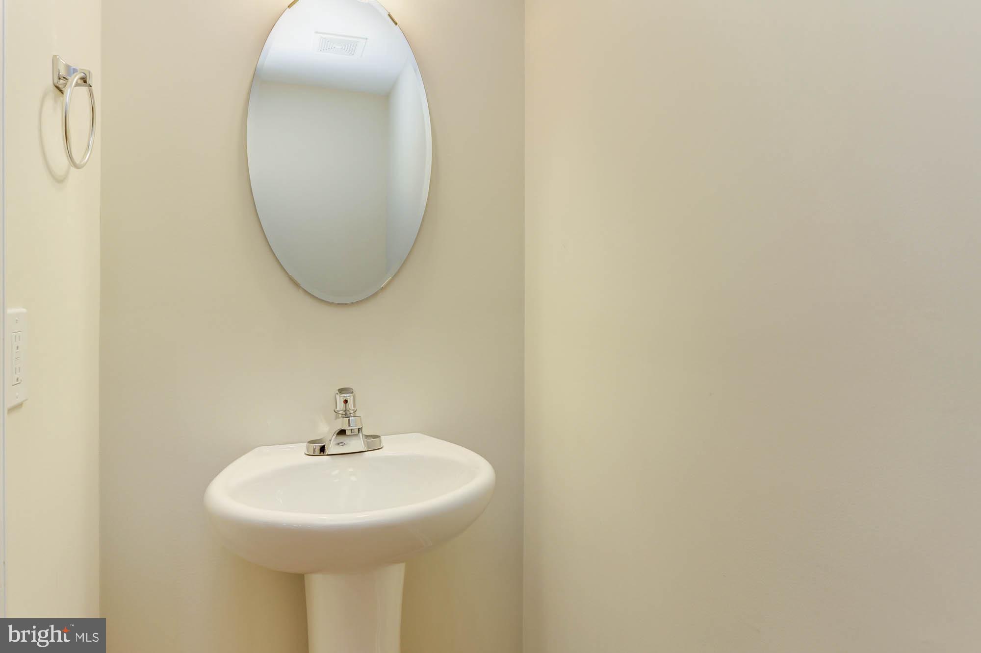 4625 Dillon Place Baltimore, MD 21224 - Photo 16 of 41 Main level powder room