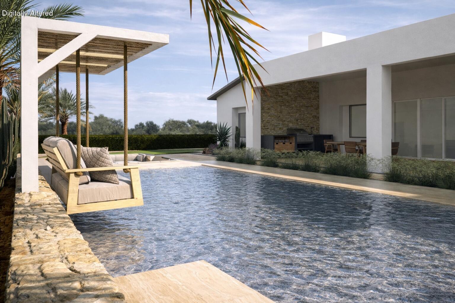 1 Via Perugia Rancho Mirage, CA 92270 - Photo 4 of 19 a swimming pool with outdoor seating and yard