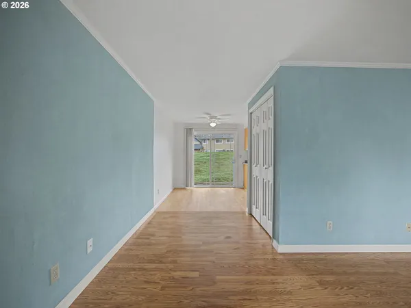 a view of an empty room and window