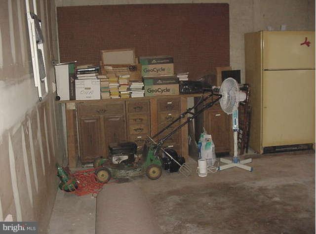 3733 Russell Road Woodbridge, VA 22192 - Photo 29 of 30 Work Bench and Extra Refrig.