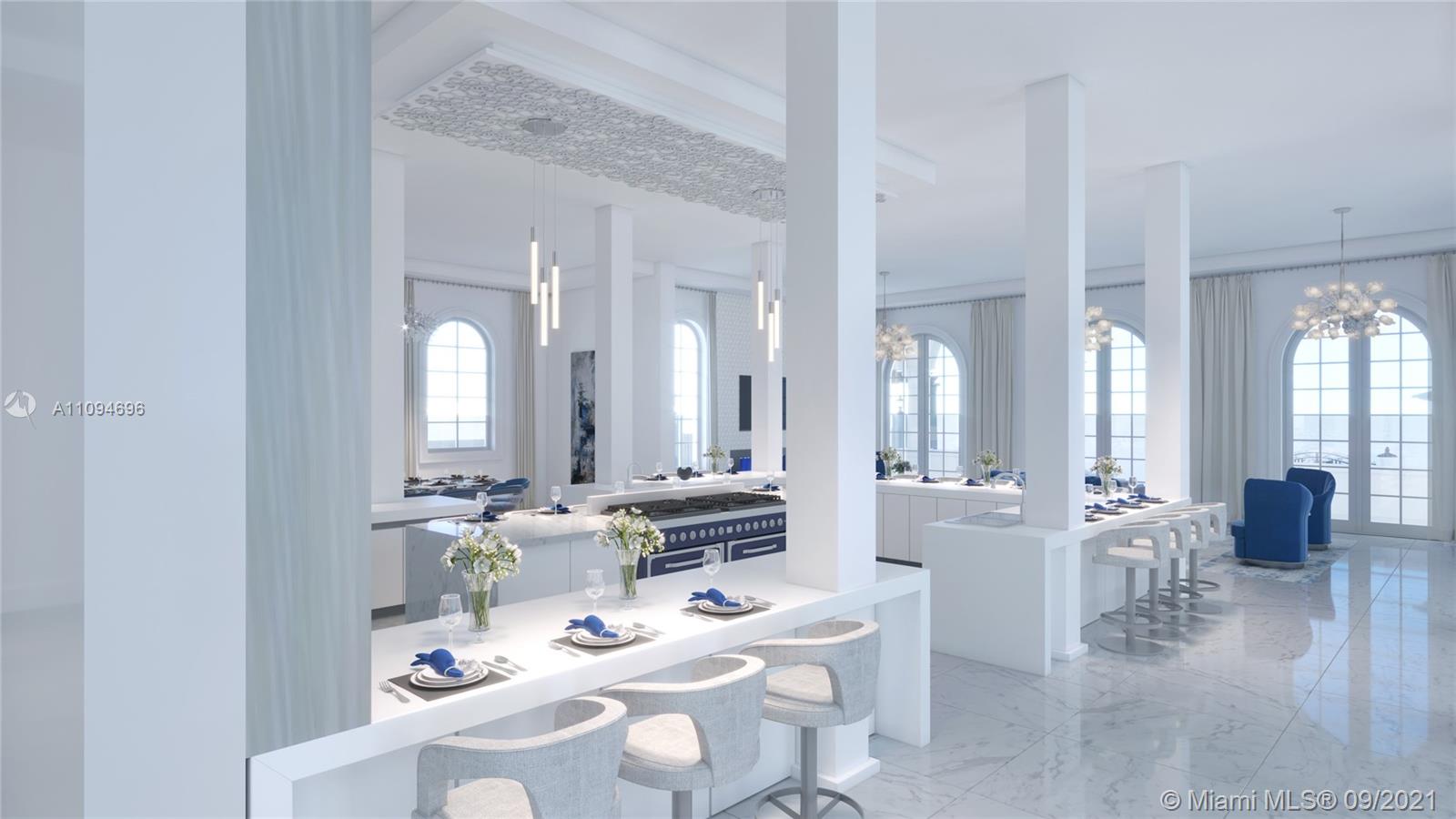 5465 Pine Tree Drive Miami Beach, FL 33140 - Photo 16 of 18 a room with lots of white furniture and a wooden floor