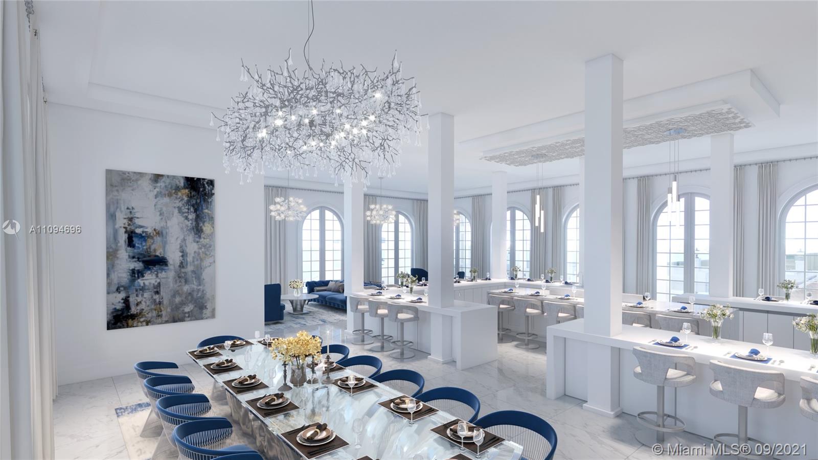 5465 Pine Tree Drive Miami Beach, FL 33140 - Photo 18 of 18 a room with lots of white furniture couches and chandelier