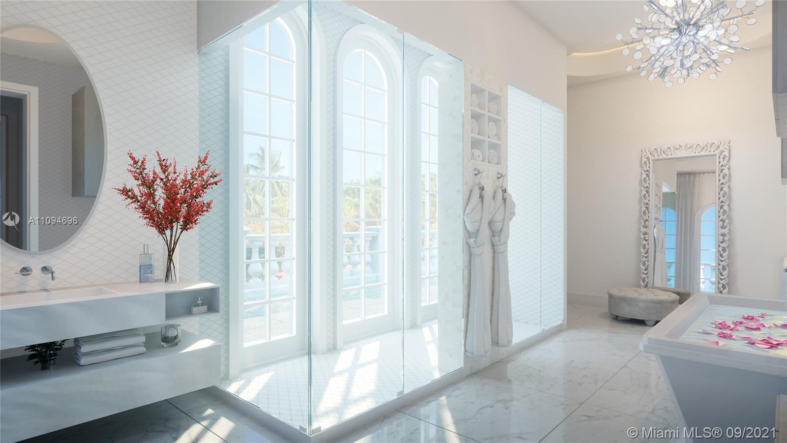 5465 Pine Tree Drive Miami Beach, FL 33140 - Photo 4 of 18 a very nice looking room with a large window and a chandelier