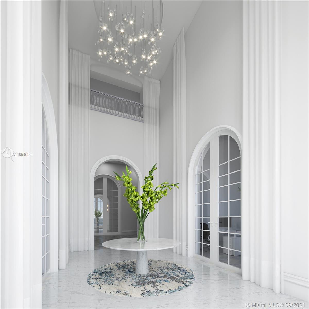 5465 Pine Tree Drive Miami Beach, FL 33140 - Photo 7 of 18 a view of a glass door with a granite countertop potted plant in the kitchen