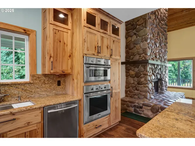 a kitchen with a stove and a refrigerator