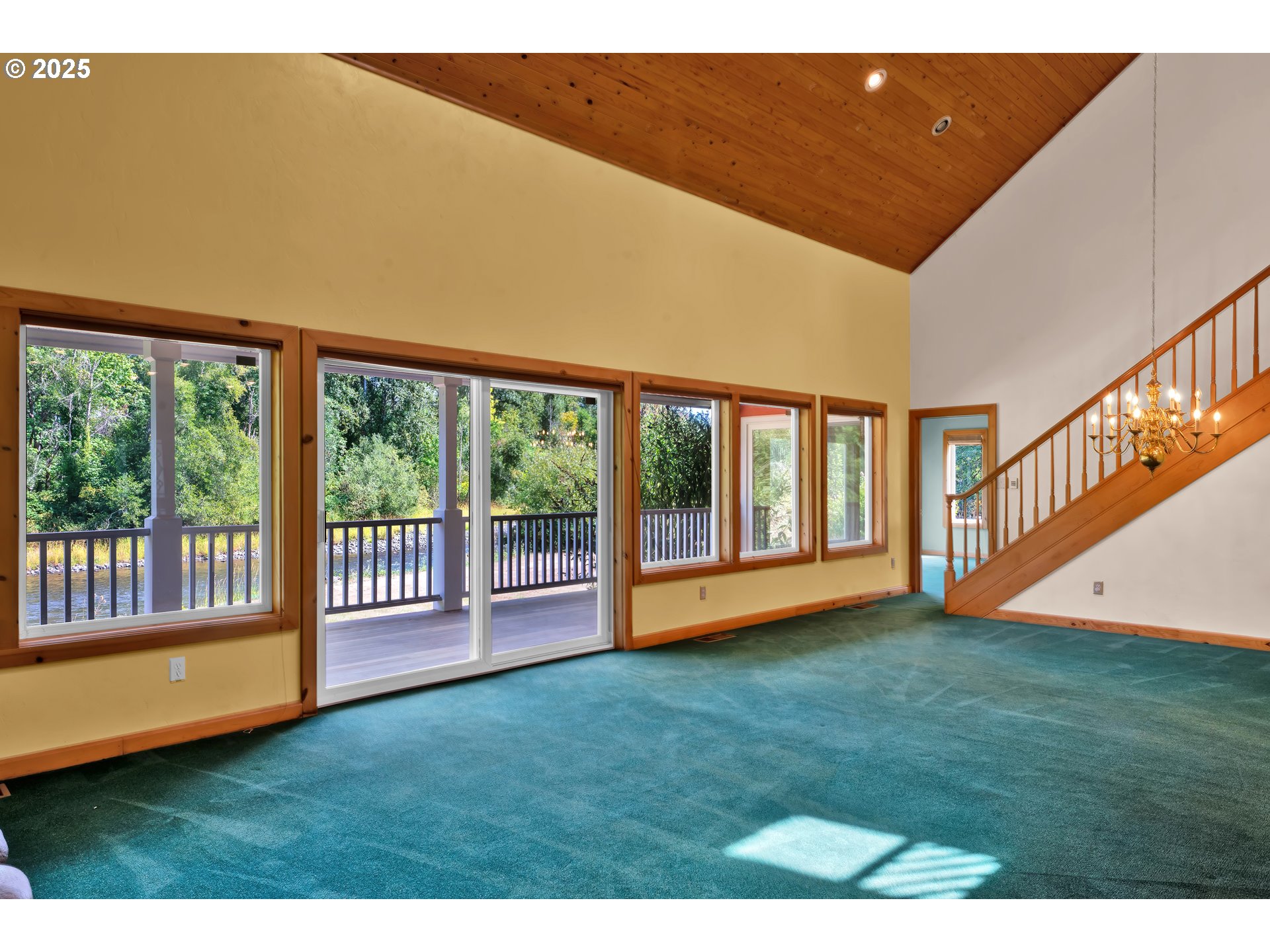 78341 Snauer Lane Cottage Grove, OR 97424 - Photo 12 of 48 a view of an empty room with yard & staircase