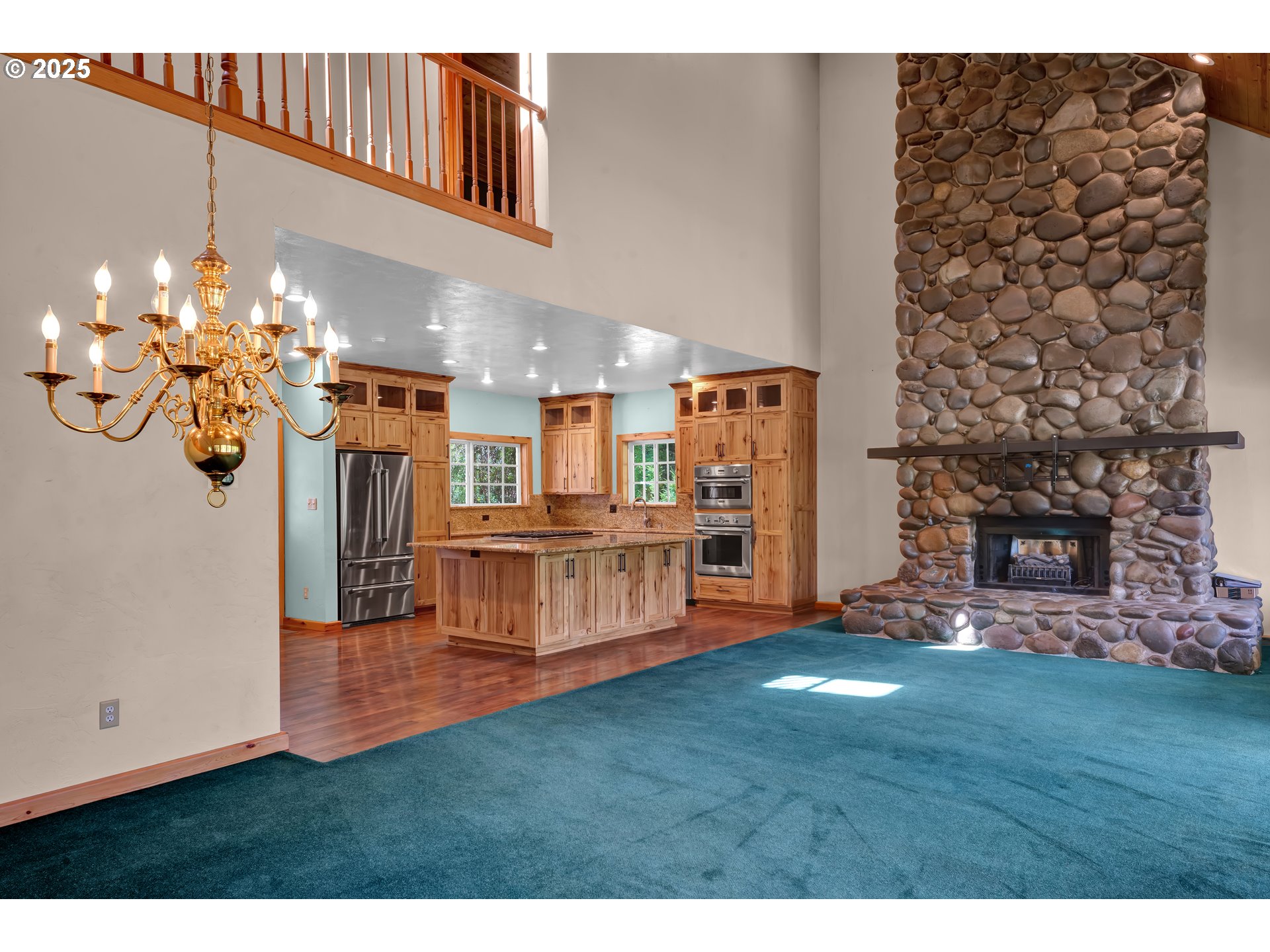 78341 Snauer Lane Cottage Grove, OR 97424 - Photo 14 of 48 a view of kitchen with livingroom and fireplace