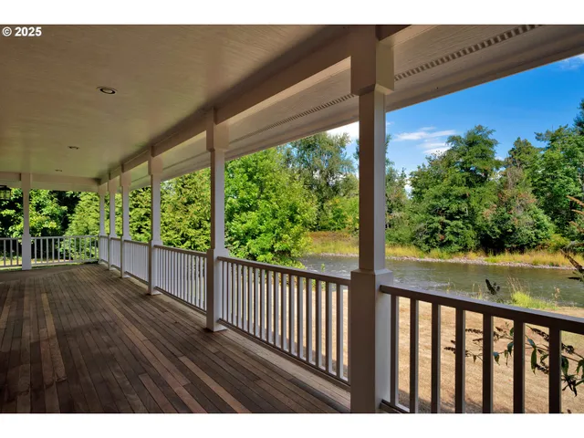 a view of balcony and yard