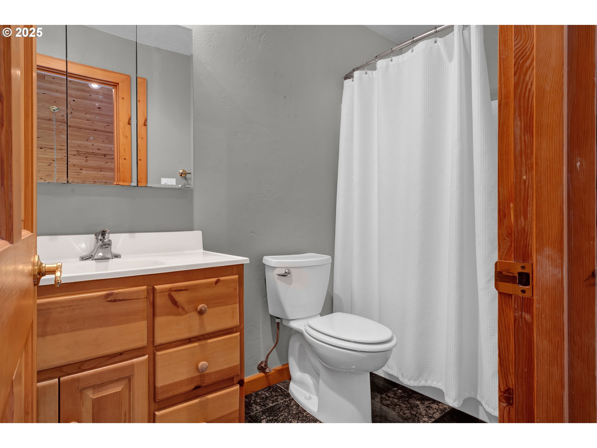 78341 Snauer Lane Cottage Grove, OR 97424 - Photo 32 of 48 a bathroom with a sink a toilet and shower