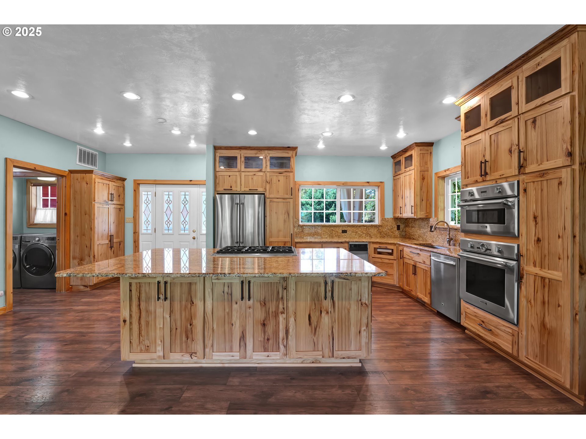 78341 Snauer Lane Cottage Grove, OR 97424 - Photo 6 of 48 a kitchen with stainless steel appliances granite countertop a refrigerator and a stove top oven