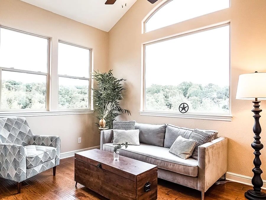 16308 Lake Loop Austin, TX 78734 - Photo 6 of 11 Living area featuring dark wood finished floors, ceiling fan, and lofted ceiling