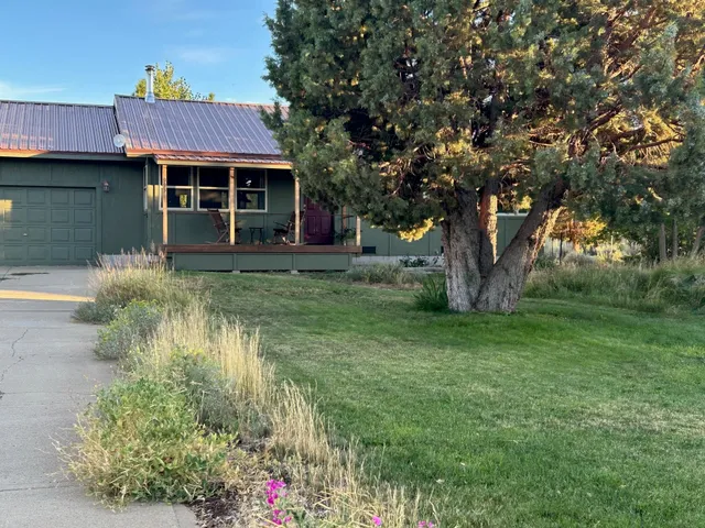 a view of a house with a garden