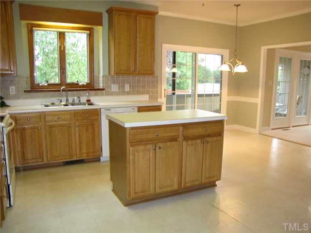 4320 Riverport Road Raleigh, NC 27616 - Photo 9 of 24 open to the Breakfast Room for a spacious, comfortable living experience