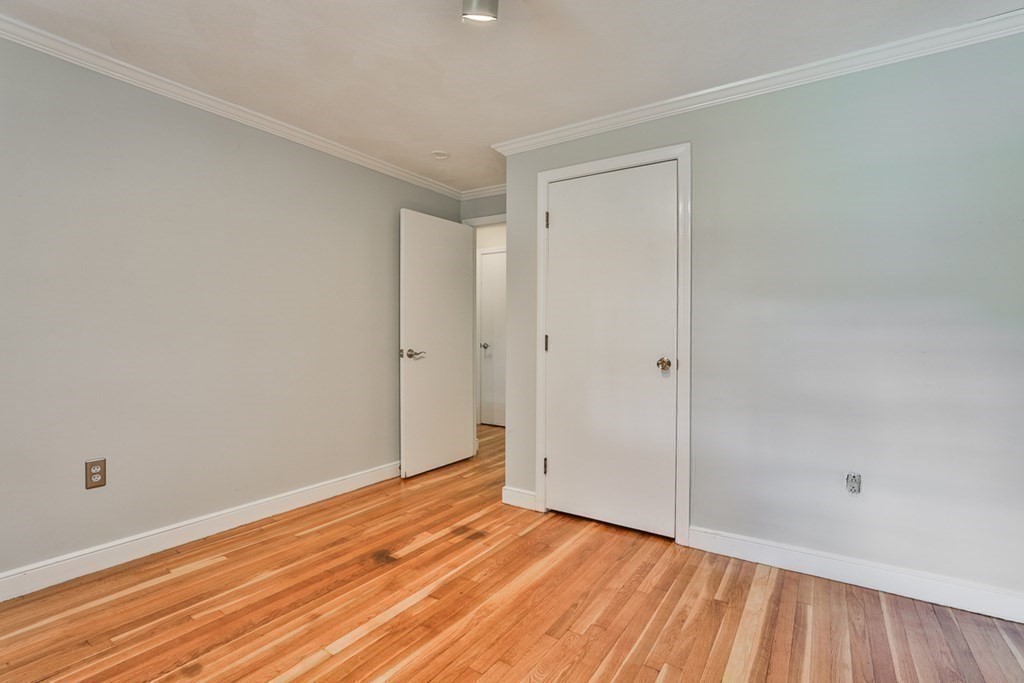 22 Withington Lane Harvard, MA 01451 - Photo 12 of 26 a view of an empty room with wooden floor