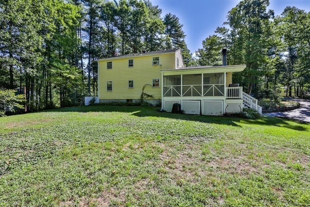 22 Withington Lane Harvard, MA 01451 - Photo 24 of 26 a view of a house with a yard