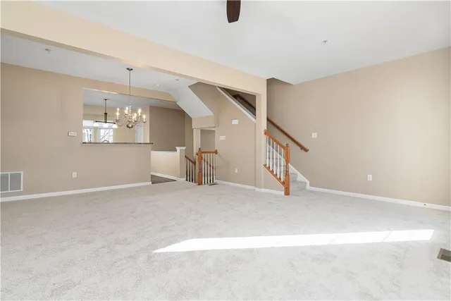 a view of a livingroom with a staircase