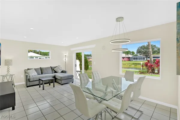 a living room with furniture and a table