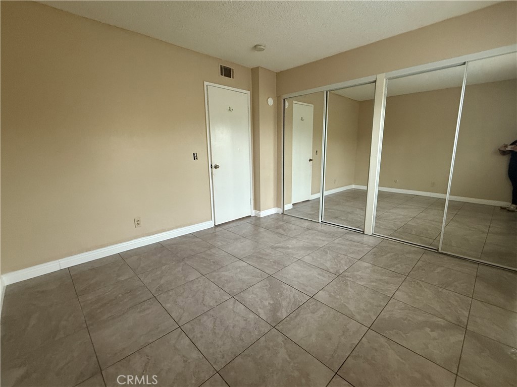 1735 East Washington Street, Unit G13 Colton, CA 92324 - Photo 17 of 19 a view of an empty room