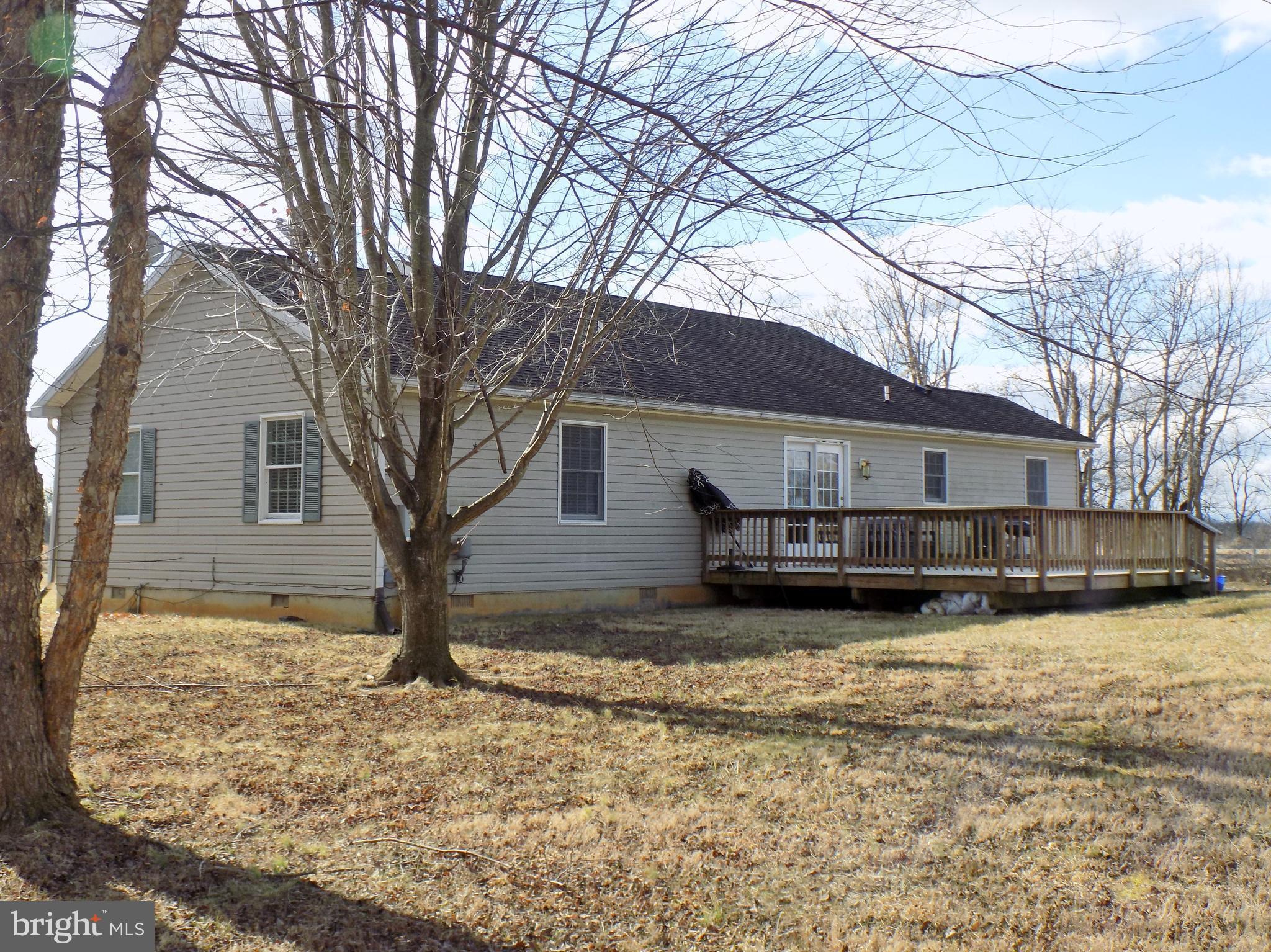 150 Longmarsh Road Berryville, VA 22611 - Photo 11 of 22 a view of a house with a yard covered in snow