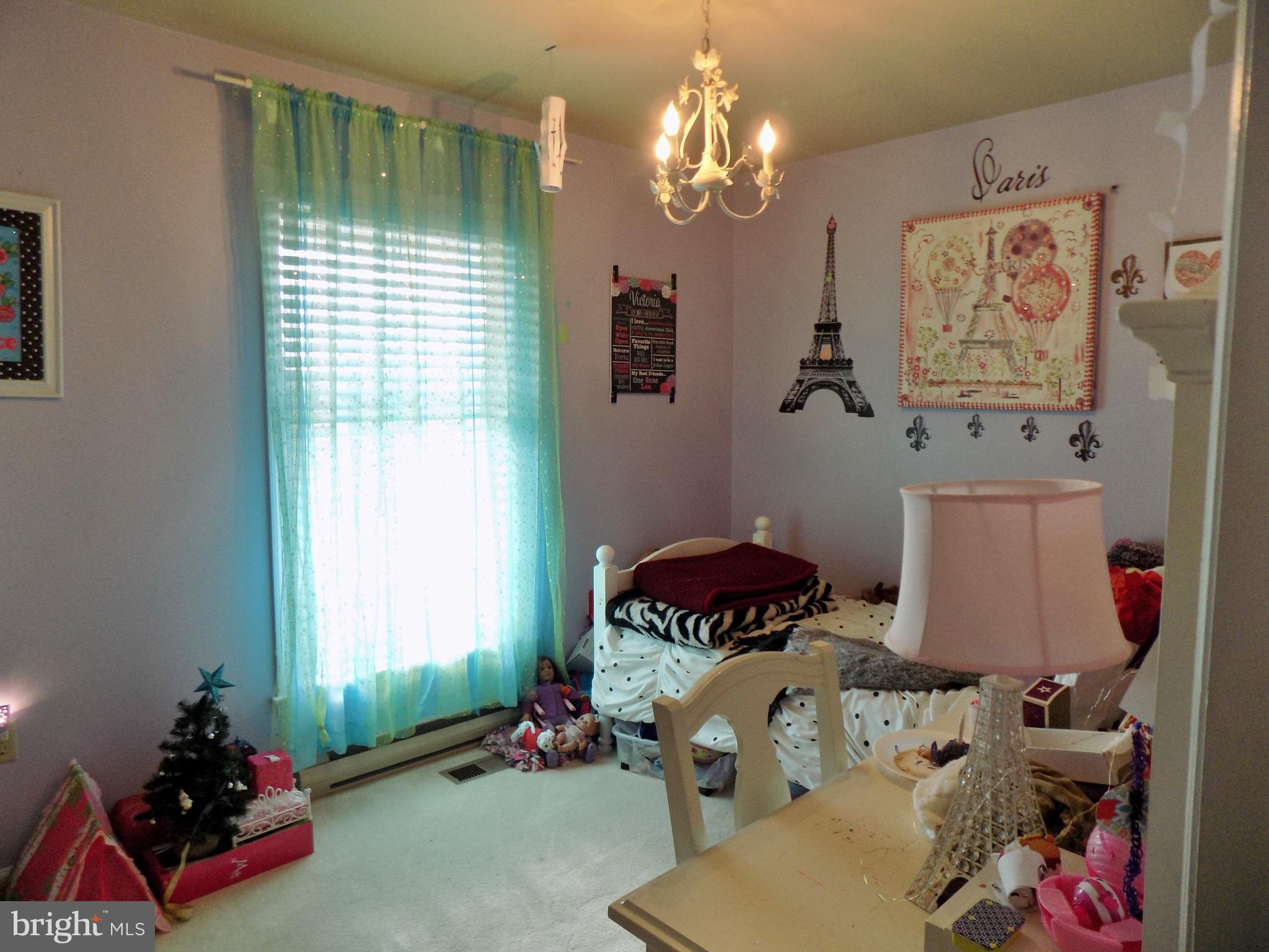 150 Longmarsh Road Berryville, VA 22611 - Photo 22 of 22 a room with toys and a chandelier