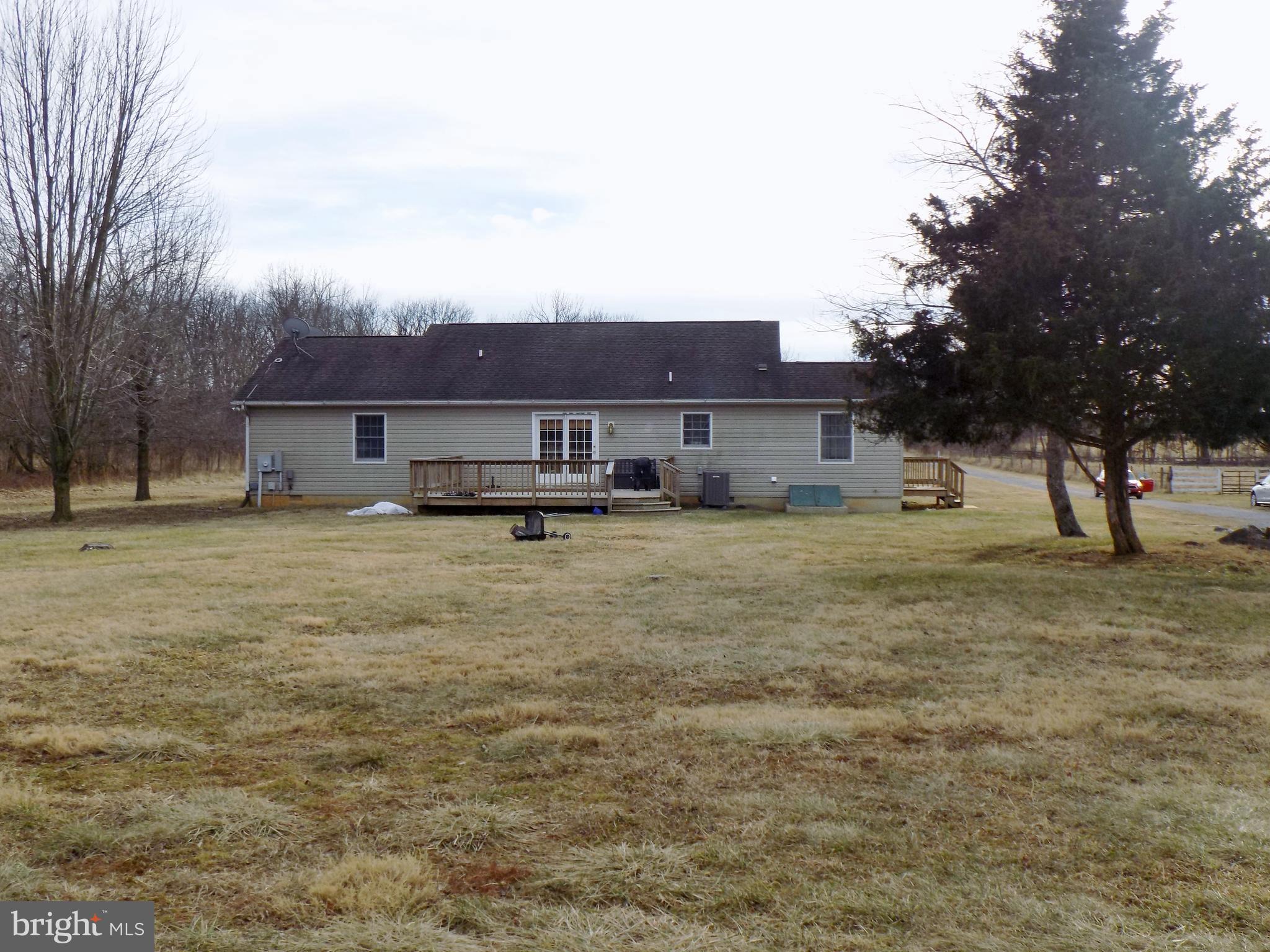 150 Longmarsh Road Berryville, VA 22611 - Photo 5 of 22 a view of large house with a big yard