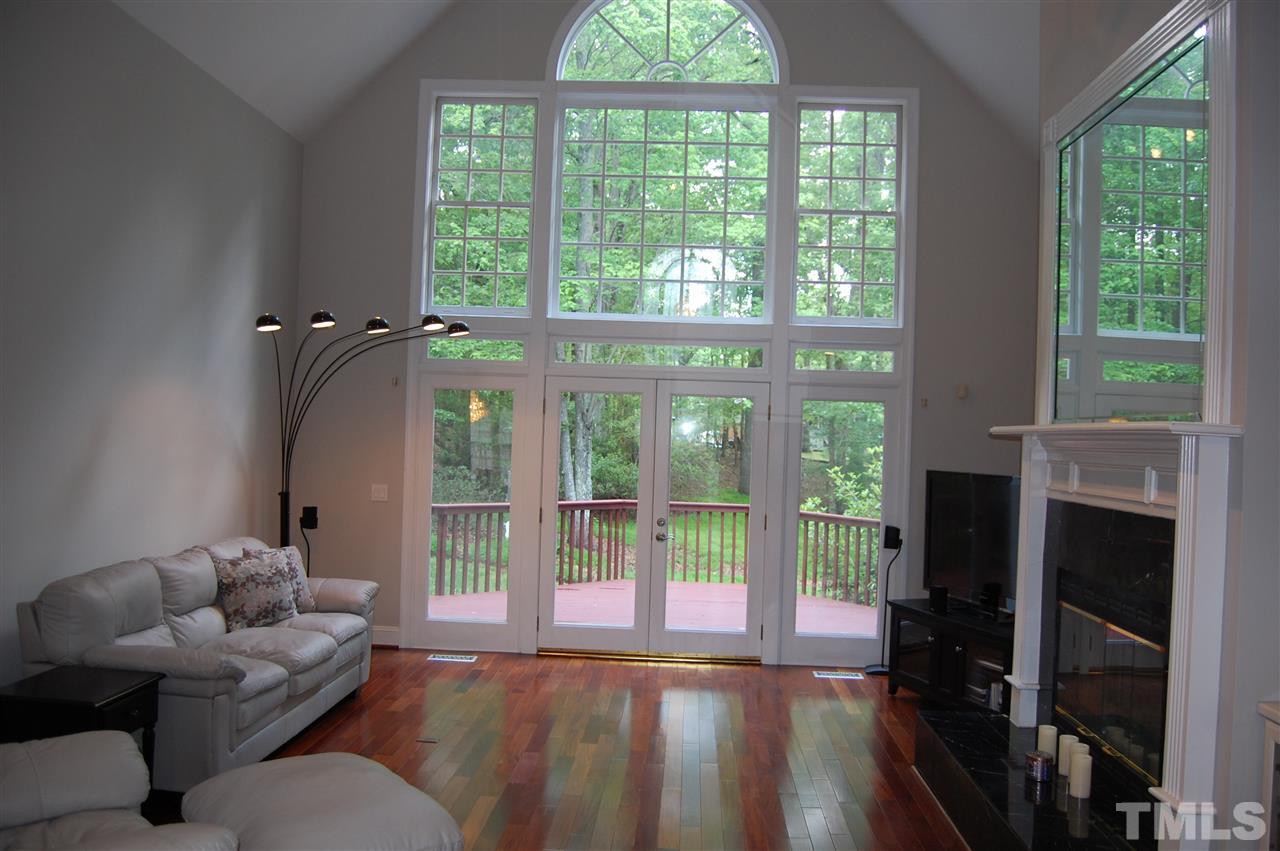 10425 Roadstead Way West Raleigh, NC 27613 - Photo 3 of 25 a living room with furniture and a large window