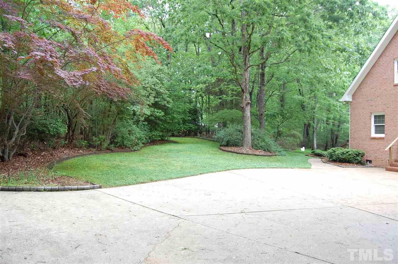 10425 Roadstead Way West Raleigh, NC 27613 - Photo 22 of 25 a view of backyard with green space