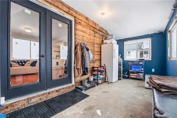 a view of room with workspace and windows