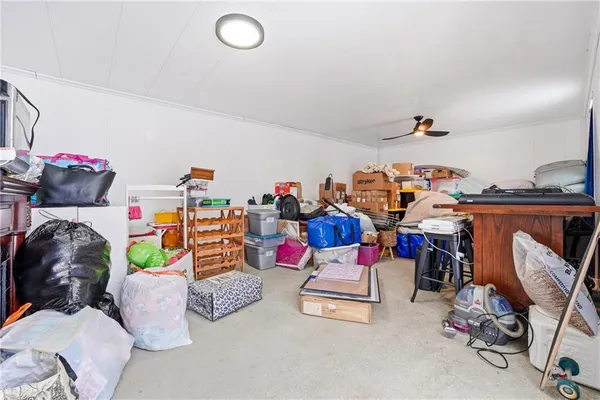 a view of a house with wooden floor roof and furniture
