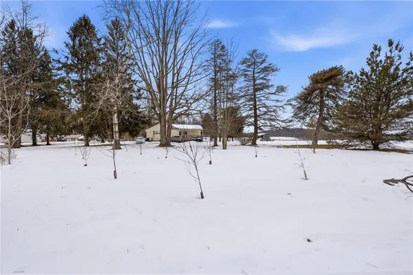 a view of a snow on the road