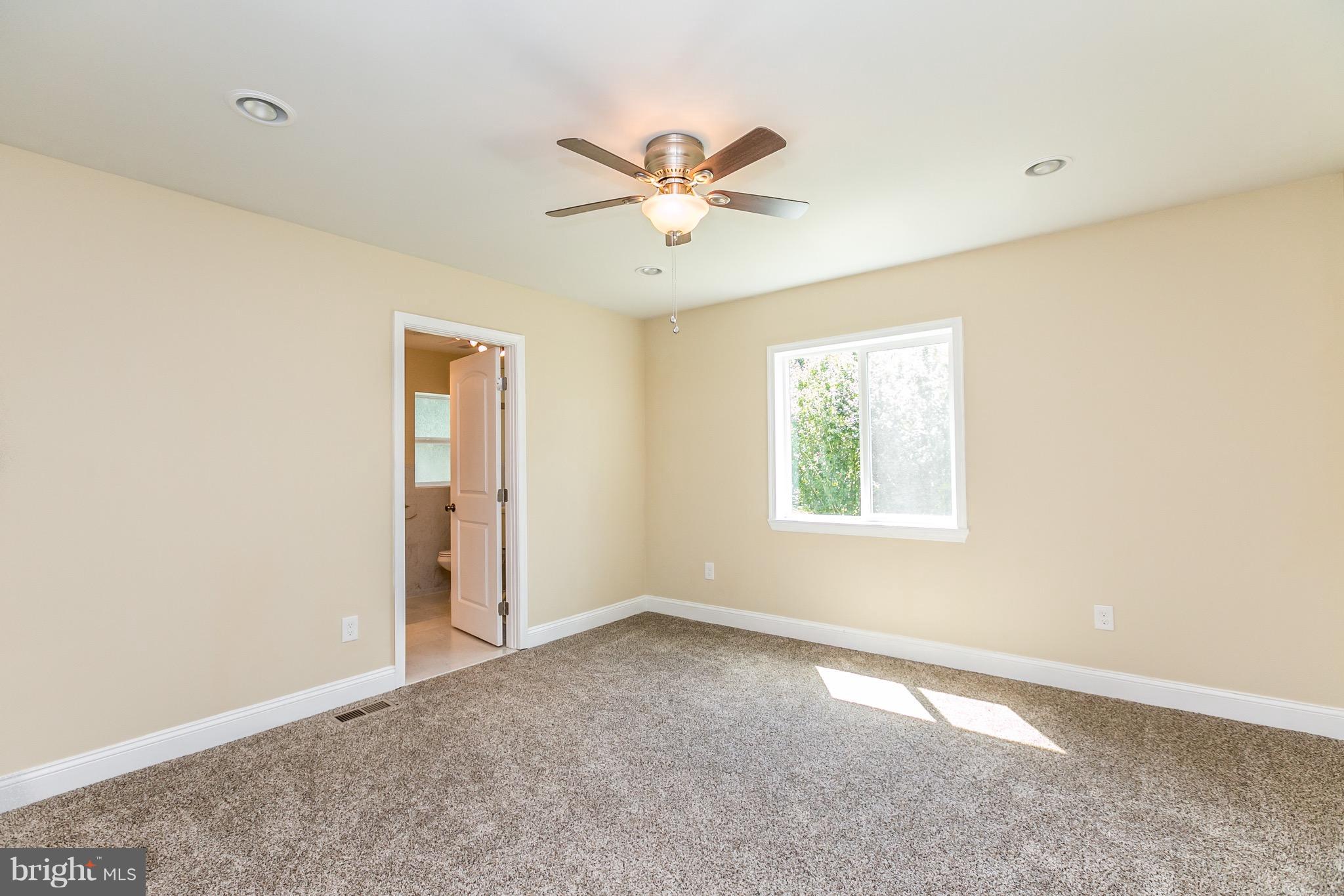 115 Nelson Road Pikesville, MD 21208 - Photo 12 of 30 First floor Master Bedroom.