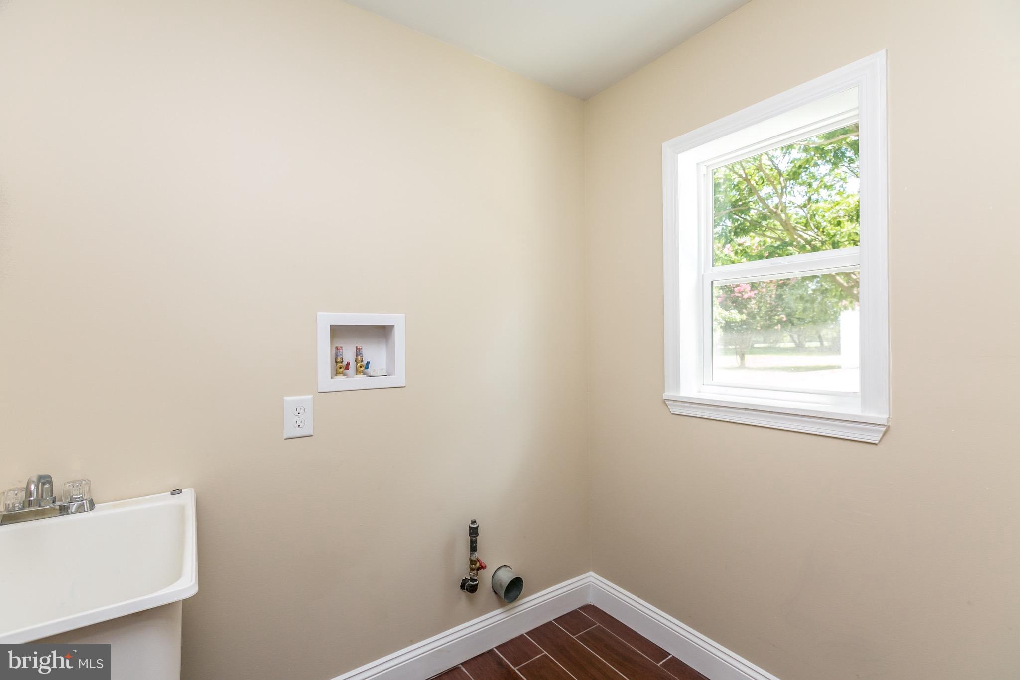 115 Nelson Road Pikesville, MD 21208 - Photo 15 of 30 Utility with W/D hookup off kitchen,