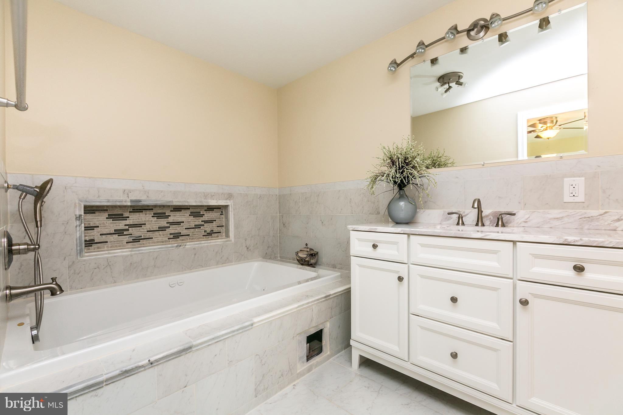 115 Nelson Road Pikesville, MD 21208 - Photo 9 of 30 Master Bath with jacuzzi tub.