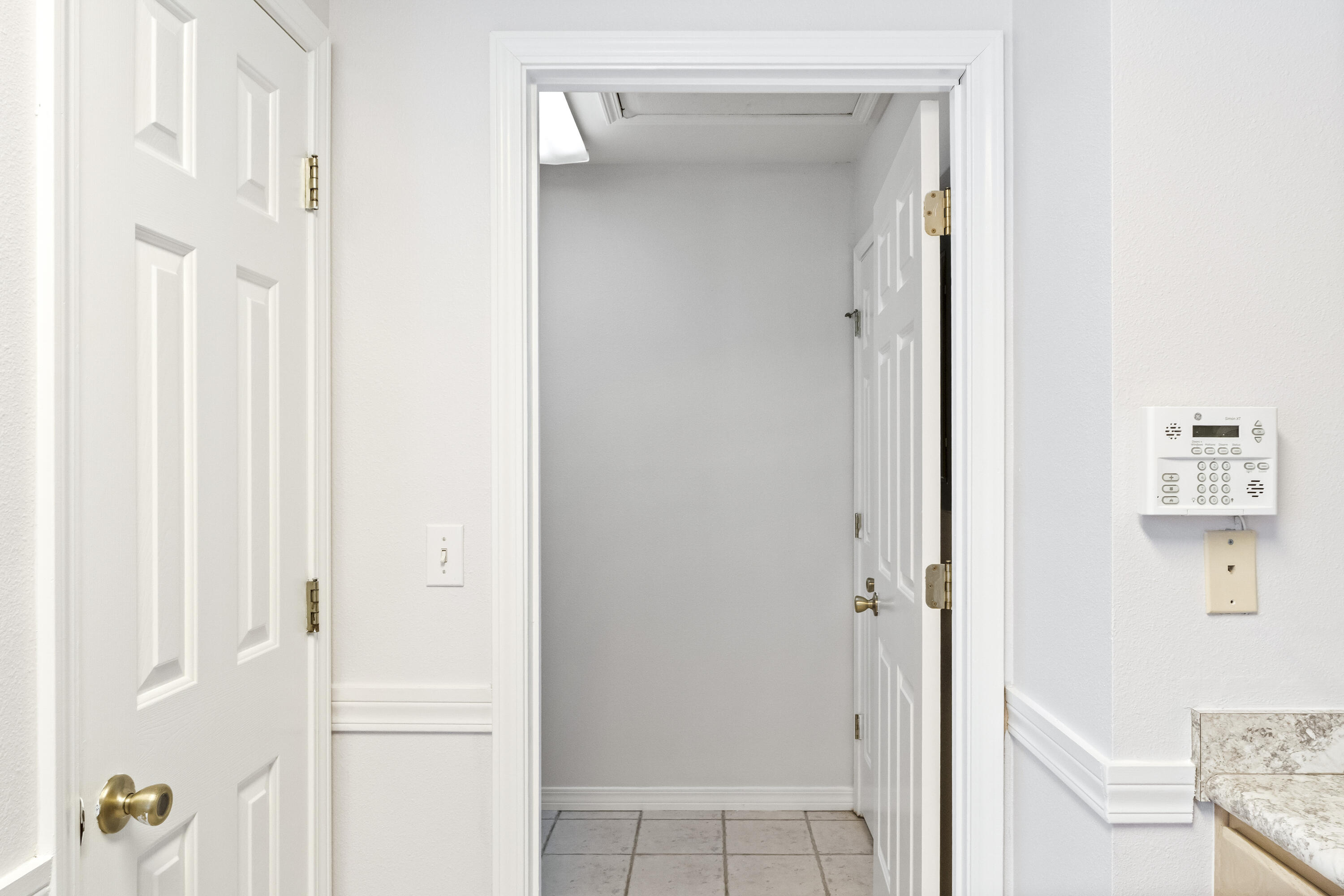 56 Kimberly Ann Drive Santa Rosa Beach, FL 32459 - Photo 13 of 39 a view of a hallway with closet and a bathroom