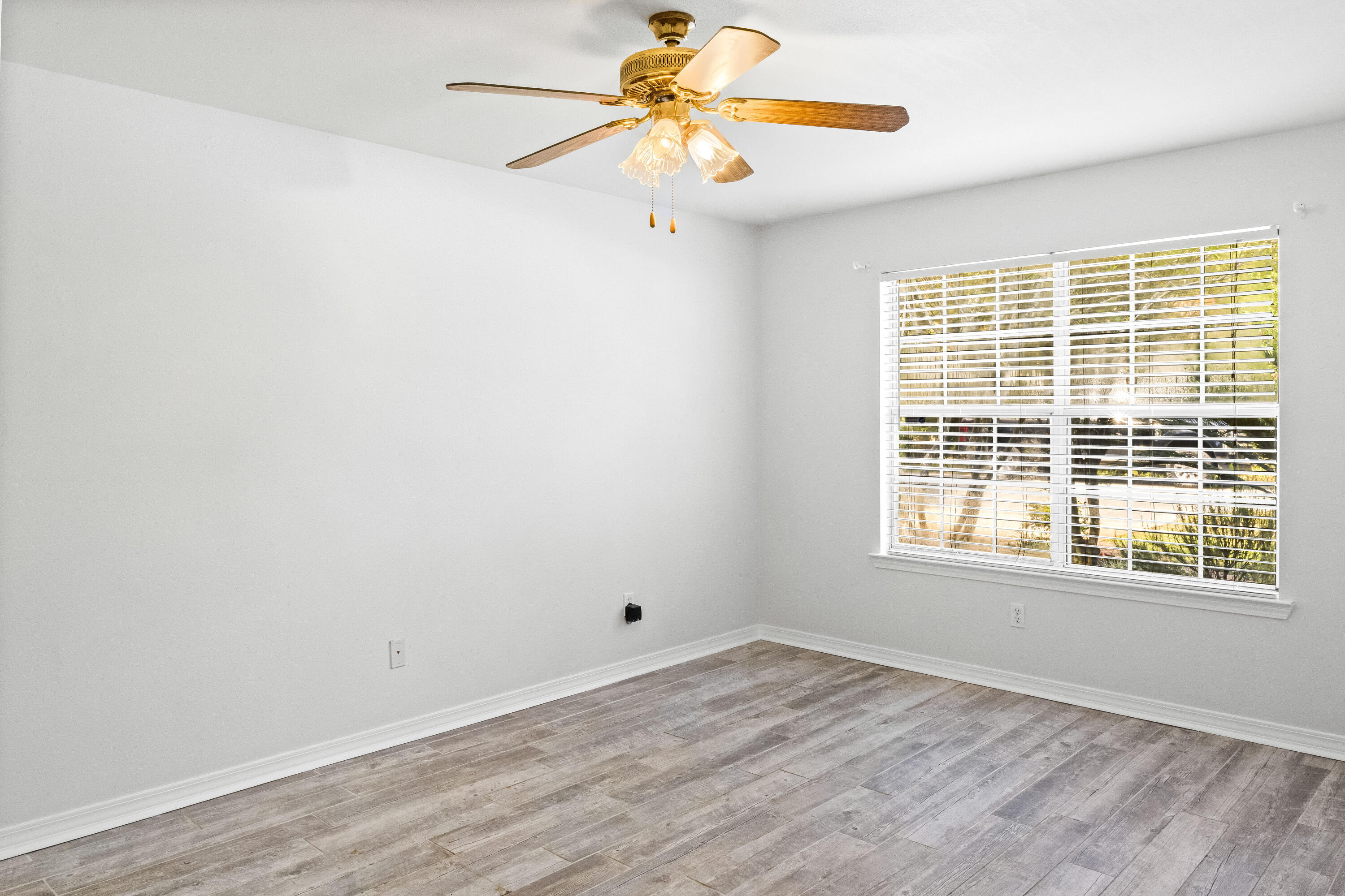 56 Kimberly Ann Drive Santa Rosa Beach, FL 32459 - Photo 16 of 39 a view of a room with window and wooden floor