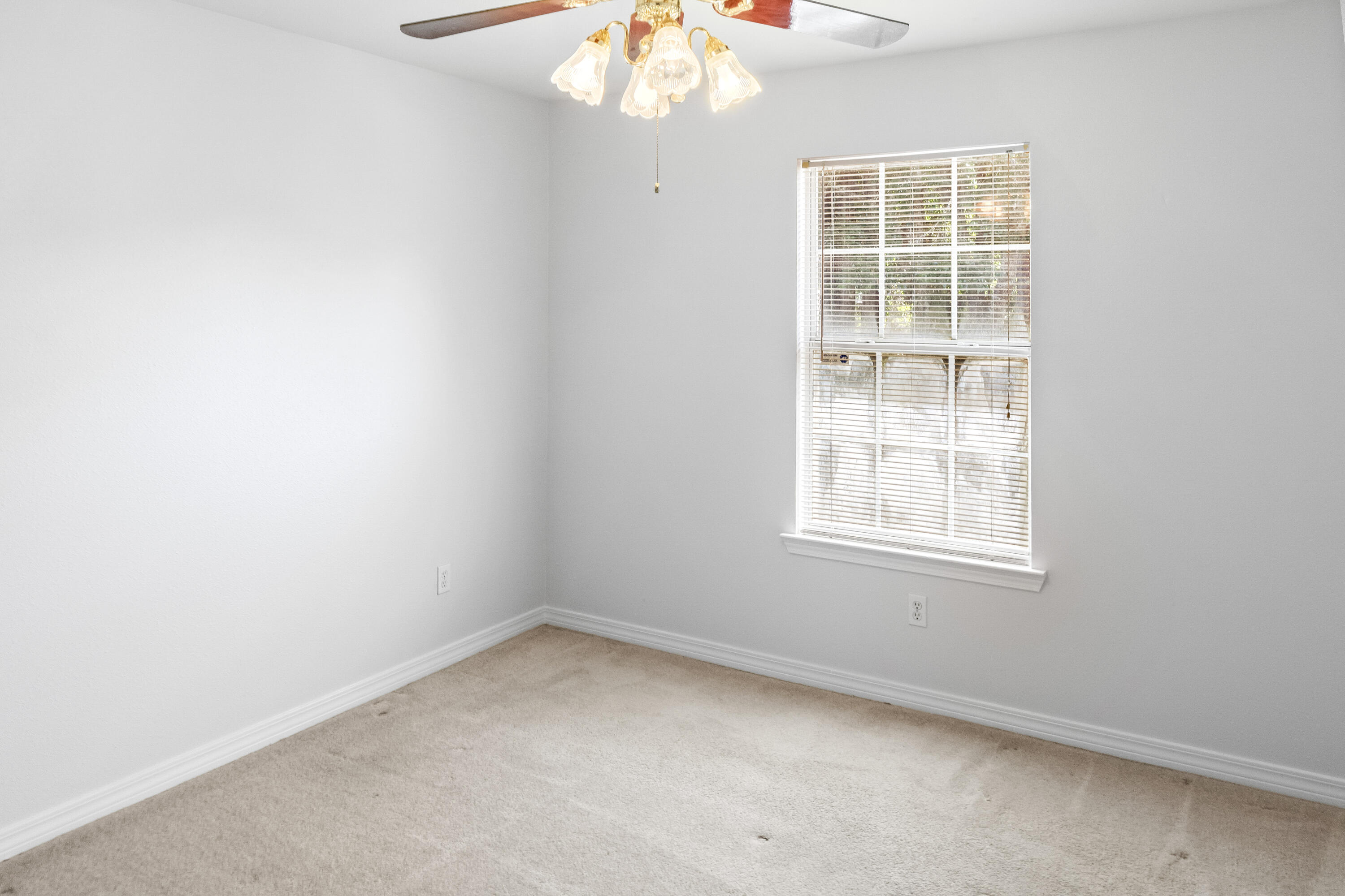 56 Kimberly Ann Drive Santa Rosa Beach, FL 32459 - Photo 24 of 39 an empty room with a window