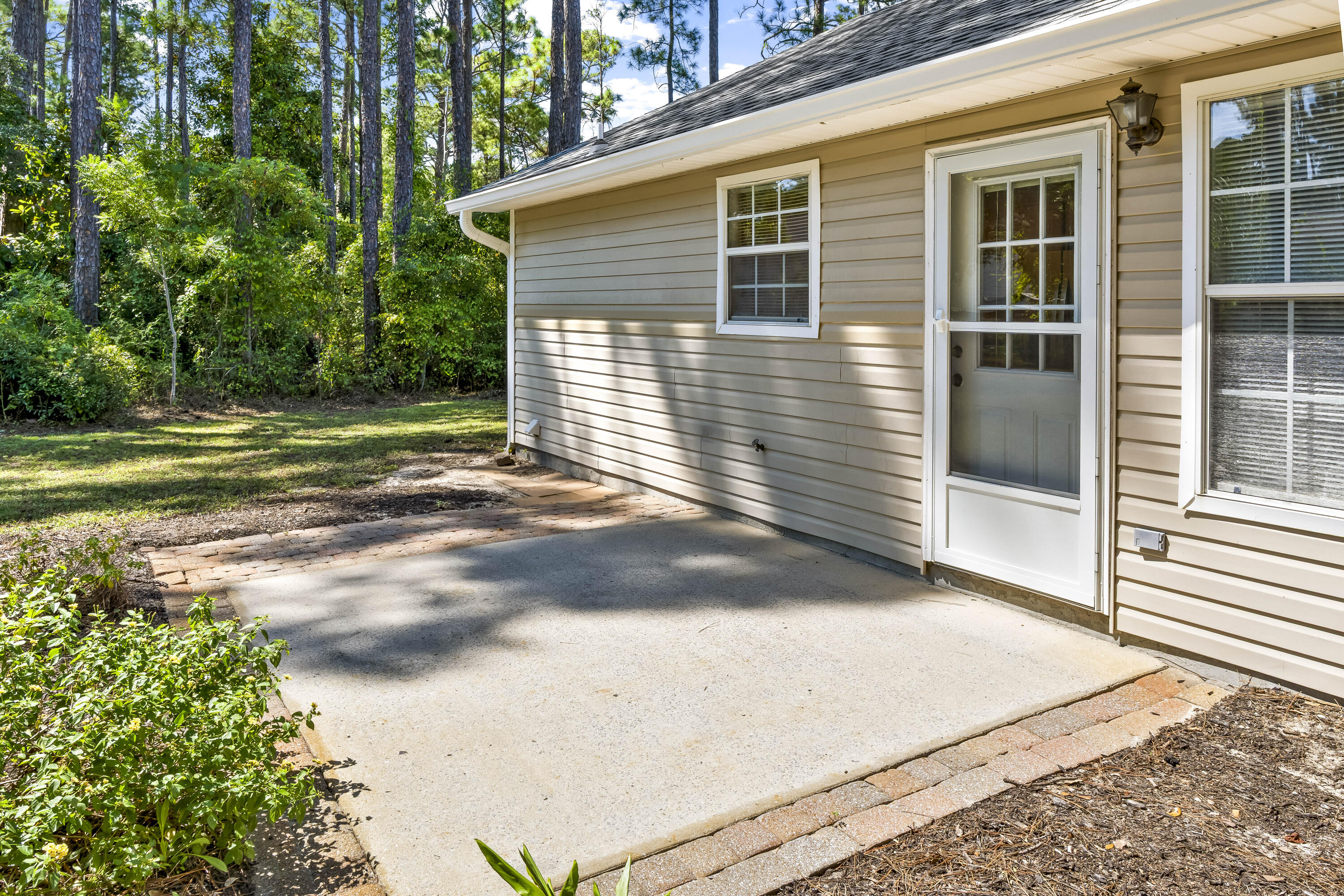 56 Kimberly Ann Drive Santa Rosa Beach, FL 32459 - Photo 31 of 39 a view of a backyard of the house