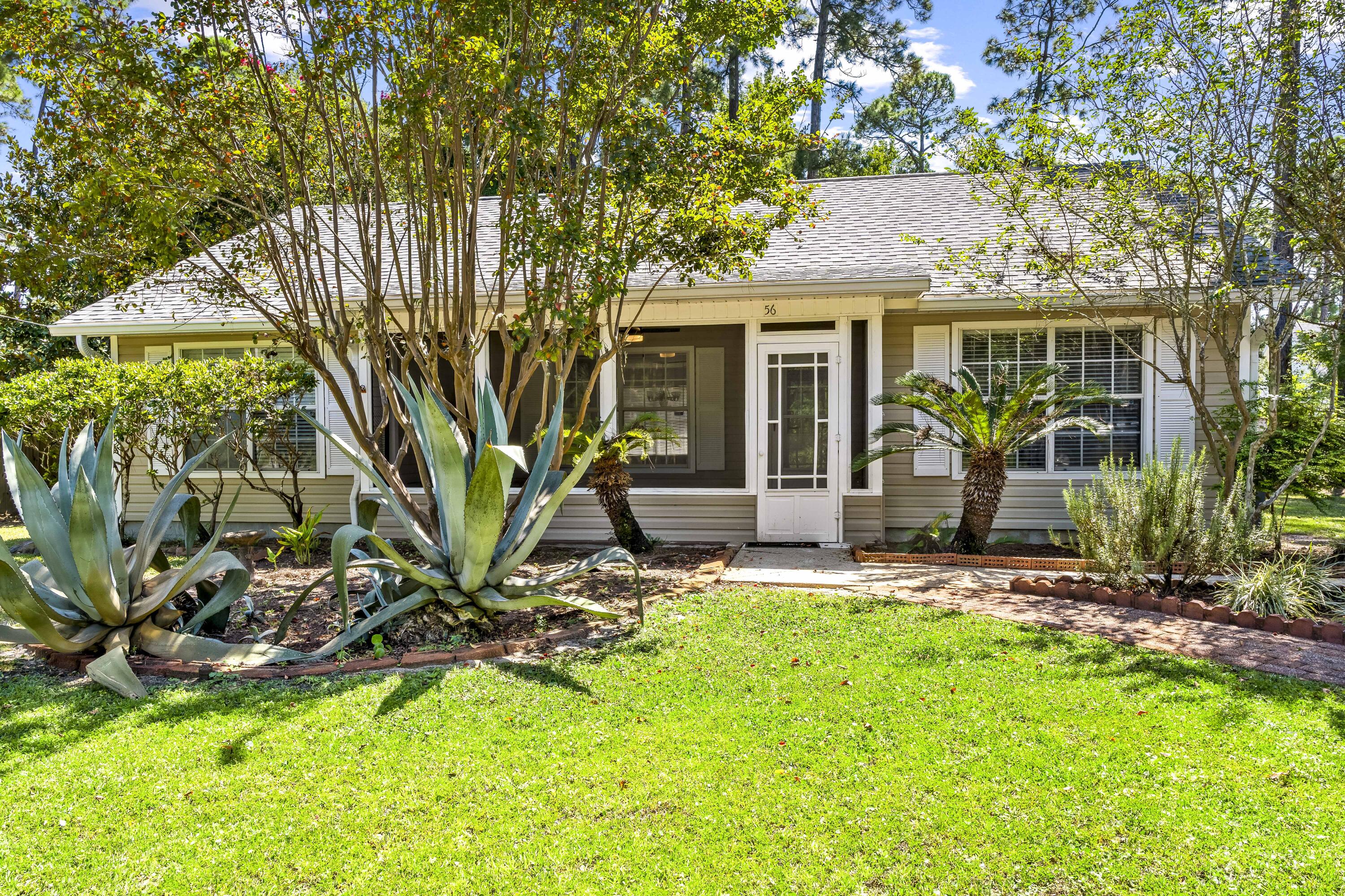 56 Kimberly Ann Drive Santa Rosa Beach, FL 32459 - Photo 37 of 39 a view of a house with backyard porch and sitting area