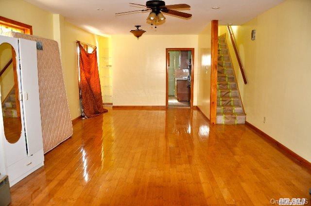 Undisclosed Address Queens, NY 11421 - Photo 2 of 11 LIVING ROOM