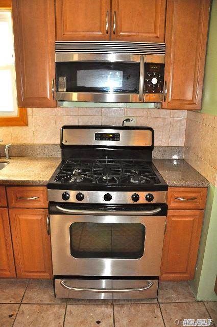 Undisclosed Address Queens, NY 11421 - Photo 5 of 11 Appliances