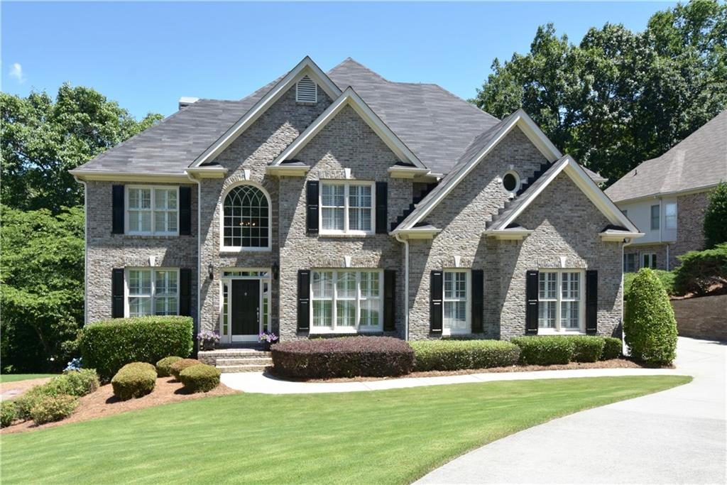 Beautiful three-sided brick home in sought after Three Chimneys Farm S/D.  Please see the VT link for additional photos.  Top rated schools! Low Forsyth Co. property taxes!    